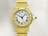 an image of a gold wrist watch with roman numerals and a white dial