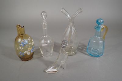 three glass vases sitting next to each other on a table
