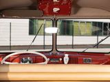 a view of the interior of a car from the driver ' s seat