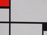 an abstract painting of red, black, and white squares on a brown surface