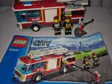 a lego city fire truck and a lego city firetruck
