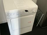 a white washer and dryer sitting next to each other