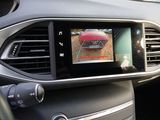 a picture of a car dashboard with a monitor in it