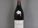 a bottle of wine that is sitting on a table