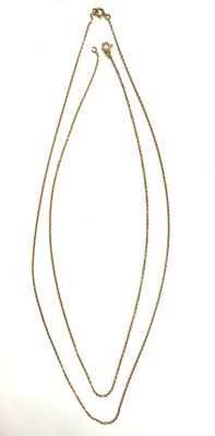 two necklaces that are attached to each other on a white surface