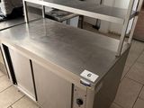 a stainless steel counter in a commercial kitchen