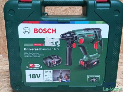 a close up of a box with a cordless hammer in it