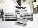 several old black and white photos of people and boats on a white surface