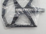 a pair of bicycle pedals that are wrapped in plastic