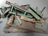 a pile of old metal tools sitting on a table