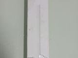 a white light switch on the wall in a room