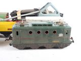 a toy train that is sitting next to a toy truck