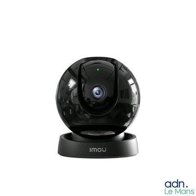 a close up of a camera on a stand on a white surface