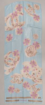 a blue towel with pink and white flowers on it