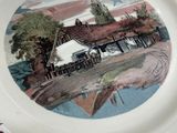 a plate with a picture of a train on it