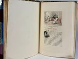 an open book with a picture of a cat on it