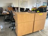 an image of a desk with a lot of clutter on it