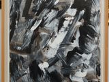 painting of a black and white abstract painting in a wooden frame