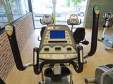 an image of a gym room with a tread machine