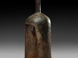 an image of a wooden sculpture of a man ' s head on top of a wooden block