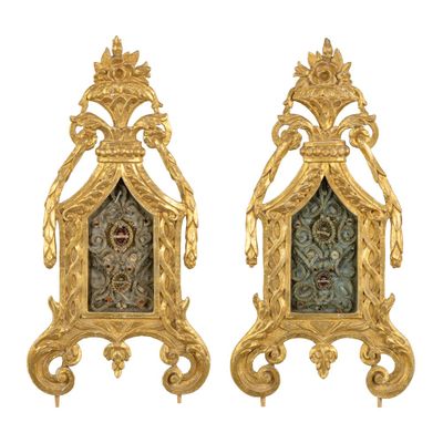 pair of gilet - style gilves with glass panels in the form of a clock