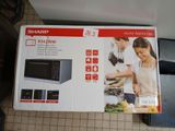 a box with a picture of a woman cooking in a kitchen