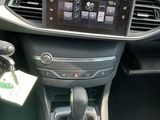 the dashboard of a car with a digital display in the center