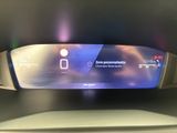 a digital display on the dashboard of a car