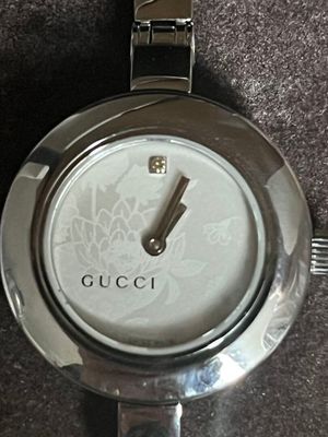 a close up of a wrist watch on a table