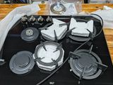 a picture of a stove top with a lot of burners on it