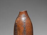 an image of a brown vase sitting on top of a table