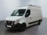 the white van is parked in a large room with a black floor