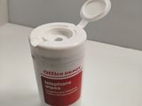 a cup with a spoon in it sitting on a table