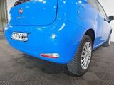 a blue car that is parked in a garage