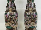 pair of antique chinese vases with hand painted flowers on them