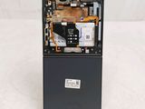 a picture of a cell phone with a broken battery