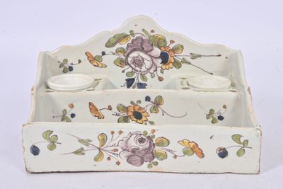 a white tray with a flower design on it