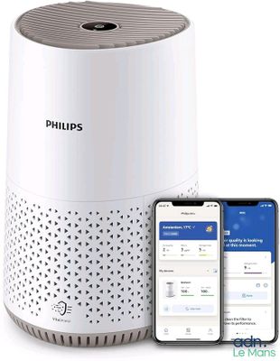 Le purificateur d'air Philips se trouve à côté d'un iPhone et d'un smartphone