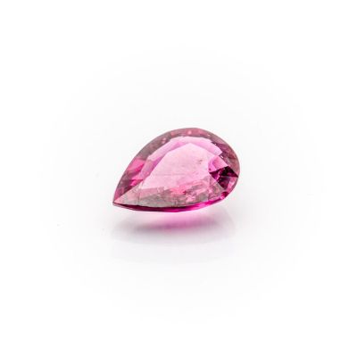 a pink tourmaline gems on a white background