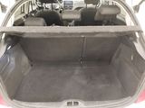 a trunk of a car with the back seat folded down