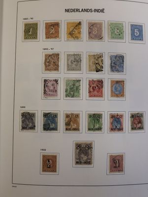 an open book with a bunch of different stamps on it