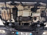 a picture of the back of a truck with its hood open