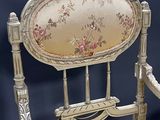 a chair that has a floral pattern on it