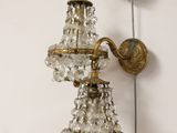 a wall light that is hanging on the wall