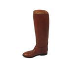 the tall brown boots are lined up and ready to be worn