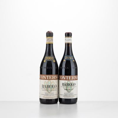 two bottles of wine sit side by side on a table