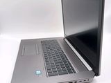 a laptop computer that is sitting on a table