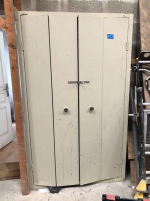 an image of a room with a ladder and a cabinet