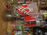 many different types of soda bottles in this box