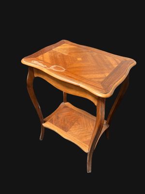 an image of a wooden table with a shelf underneath it